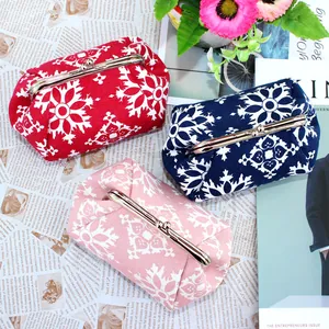 Porte-monnaie en tissu de style ethnique avec imprimé floral et fermoir en métal