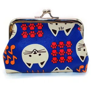 Detailed view of blue cat-themed coin purse with textured finish and metal clasp