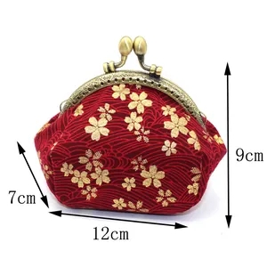 Japanese style fabric coin purse with gold sakura pattern and vintage metal clasp