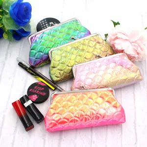 Detailed view of colorful mermaid fish scale clutch purses with silver metal clasps
