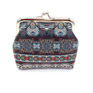 Ethnic style canvas coin purse with colorful tribal patterns and vintage metal frame clasp