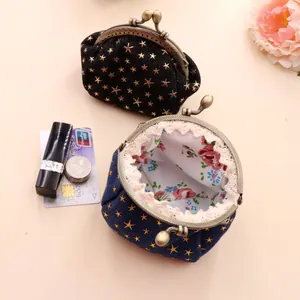 Retro denim coin purse with gold star pattern, lace trim and vintage metal clasp closure