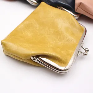 Vintage gele PU-olie wasleer portemonnee met klassieke zilveren metalen clipsluiting