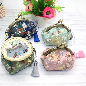 Handgefertigte Blumen-Stickerei-Geldbörse mit Vintage-Metallverschluss und Quasten