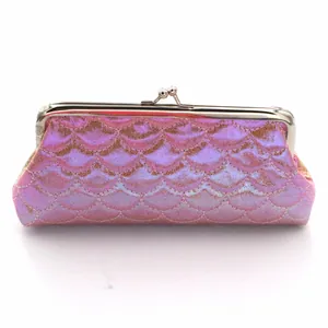 Detail view of pink mermaid scale pattern with shimmering metallic clasp closure