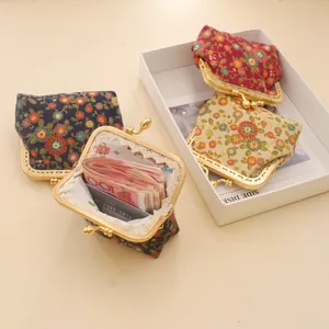 Handmade vintage floral coin purse with gold metal clasp in navy, red and beige