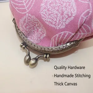 Pink canvas kiss lock coin purse with vintage floral metal clasp and embroidery