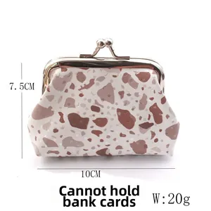 Detailed view of mini PU coin purse showing 10cm x 7.5cm size and brown stone pattern