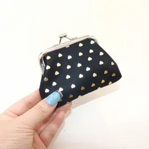 Mini black fabric coin purse with gold heart pattern and metal kiss lock frame closure