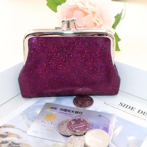Sparkly rose pink sequin coin purse with classic metal kiss lock and compact design