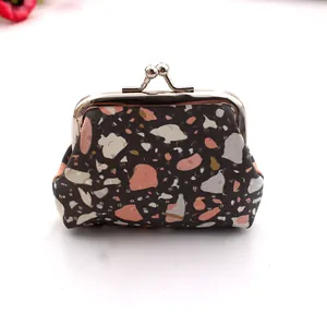 Close-up of vintage stone texture PU coin purse with classic silver metal clasp