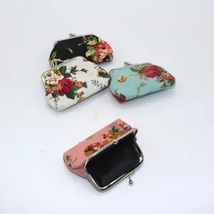 Mini canvas coin purses with vintage floral patterns and secure metal clasp closure