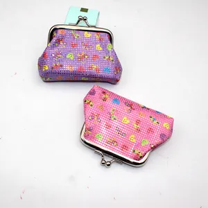 Detailed view of mini laser PU coin purses with cute prints and vintage metal clasp closures