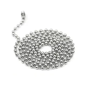 Macro shot of silver beaded chain links with metal connector clasp for jewelry making