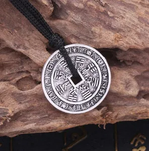 Vintage Chinese Bagua and Zodiac silver coin pendant on minimalist black woven cord