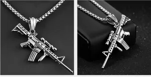 Macro shot of silver stainless steel rifle pendant with realistic carbine details and chain
