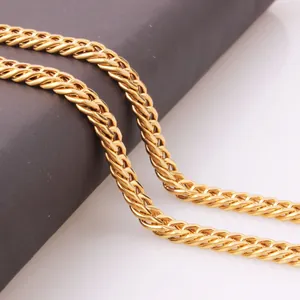 Polished gold stainless steel Franco chain bracelet for men with thick woven link texture