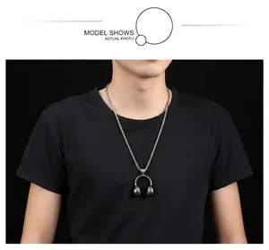 Hip hop headphones pendant necklace for men shown on a model with black t-shirt