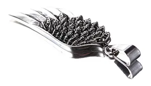 Macro shot of silver wing pendant with detailed vintage feather textures and large polished bail