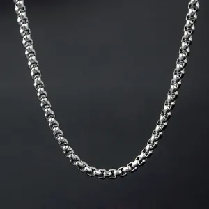 Polished silver stainless steel box chain necklace in a minimalist U-shape display