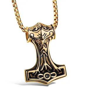 Golden Viking Mjolnir Thor's Hammer pendant necklace with intricate Nordic carvings