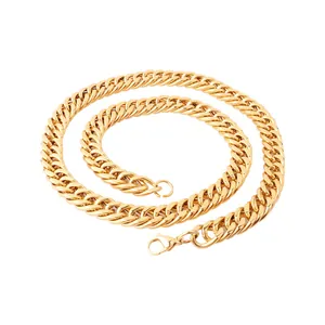 Detailed view of the gold-plated Cuban chain link texture and polished lobster clasp finish