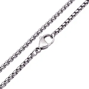 Detailed close-up of polished 3mm stainless steel box chain with engraved lobster clasp