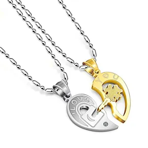 Ensemble collier couple pendentif cœur serrure et clé en finition argent et doré
