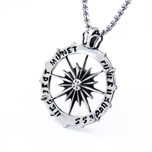 Vintage sun god pendant in stainless steel with sunburst design and engraved details