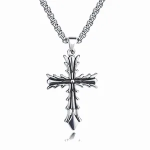 Detailed view of Gothic silver stainless steel cross pendant with intricate engravings