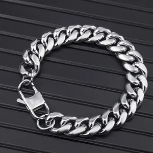 Men's silver stainless steel Cuban link necklace with square lobster clasp on black background