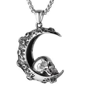 Gothic crescent moon skull pendant necklace in silver stainless steel with lunar texture