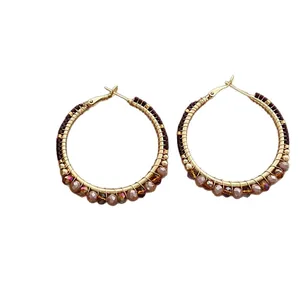 Vintage oversized gold wire hoop earrings with brown faceted crystals in bohemian style