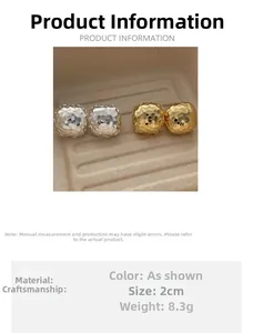 Detail view of 2cm 18k gold and silver plated metal earrings with crushed ice texture
