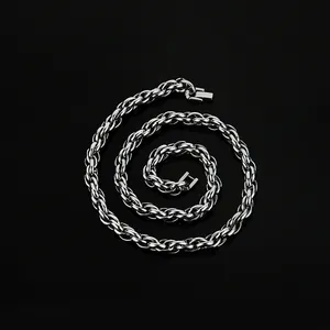 Detailed view of silver stainless steel thick braided chain with a rectangular clasp