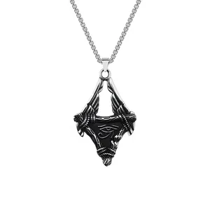 Detailed close-up of Eye of Horus pendant with wings in vintage stainless steel finish