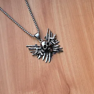 Gothic skull pendant necklace with miniature rifles and pistols in retro stainless steel