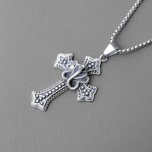 Retro punk style titanium steel necklace with cobra snake wrapped around a cross pendant