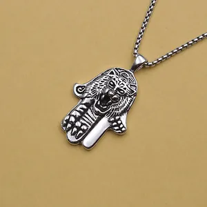 Vintage stainless steel necklace with Hamsa hand and tiger head pendant on box chain