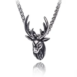 Macro detail of retro stainless steel deer head pendant with antique silver finish texture