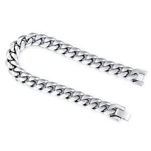 Detailed shot of heavy silver stainless steel Cuban link bracelet with a fold-over clasp