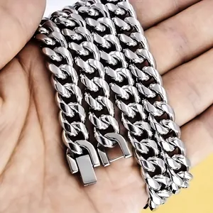 Detailed view of heavy silver stainless steel Cuban link chain with secure industrial clasp