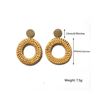 Detail view of woven rattan earrings with size markings: 15mm stud and 47mm hoop drop