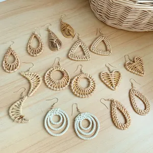 Handmade rattan earrings collection in geometric shapes with natural bohemian style