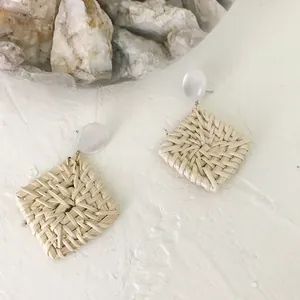 Handmade geometric square rattan earrings with resin studs in bohemian vacation style
