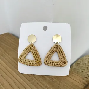 Bohemian handmade rattan earrings with triangle design and golden metal accents