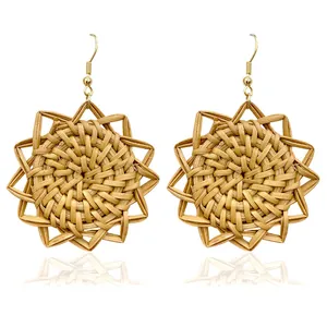 Handmade rattan woven geometric star flower earrings with golden fish hooks and reflections