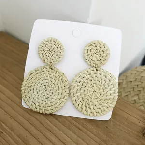 Bohemian double round rattan woven drop earrings for women on white display card