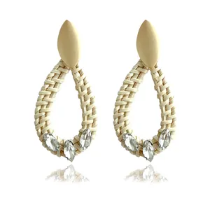Bohemian woven straw drop earrings with teardrop rattan shape and crystal accents