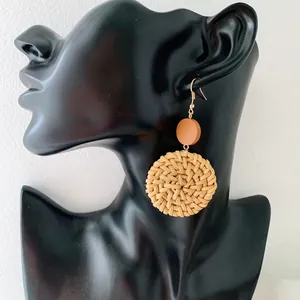 Handmade round rattan woven earrings with brown beads in bohemian style for women